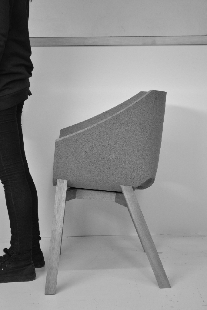 sitting on the Corkigami chair